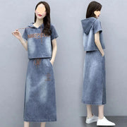 Denim outfit with a hood and long skirt on a gray background