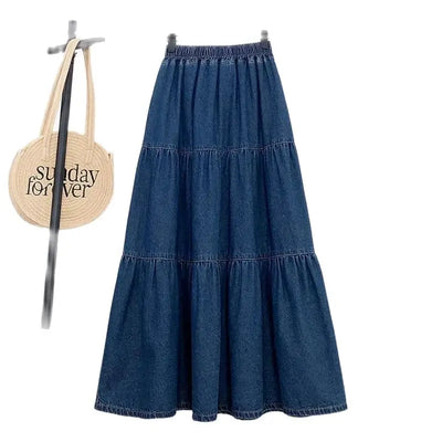 Blue denim skirt with a woven bag labeled 'Sunday Forever' on a white background