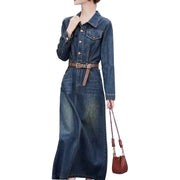 Denim dress with a belt and brown handbag on a white background