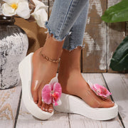 Sandales compensées à fleurs